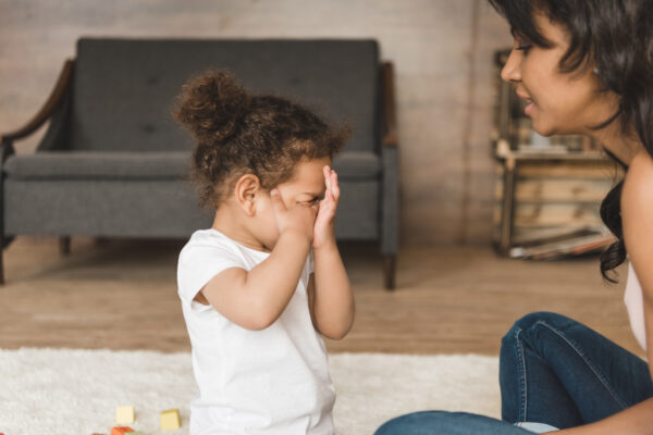 side view of mother spend time with little daughter at home - SKIDamarink KIDs why do toddlers have meltdowns, toddler tantrum