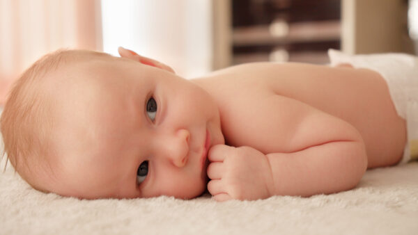 A small healthy baby being active in the morning Cute infant be - SKIDamarink KIDs