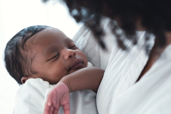 Close up portrait of cute African american newborn infant baby l - SKIDamarink KIDs caring for newborn