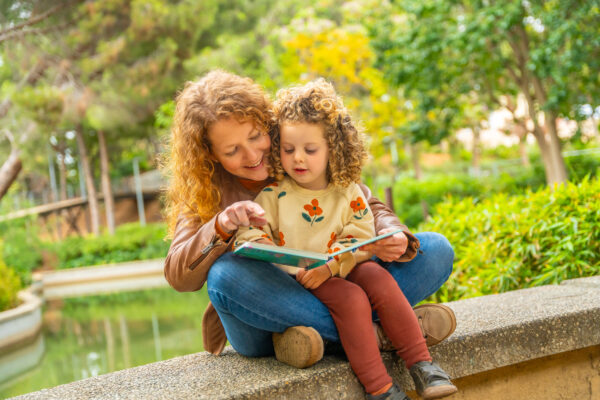mom reads to child, toddler story time, reading to toddlers, toddler language development