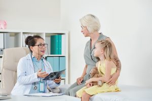 Mother talking to pediatrician