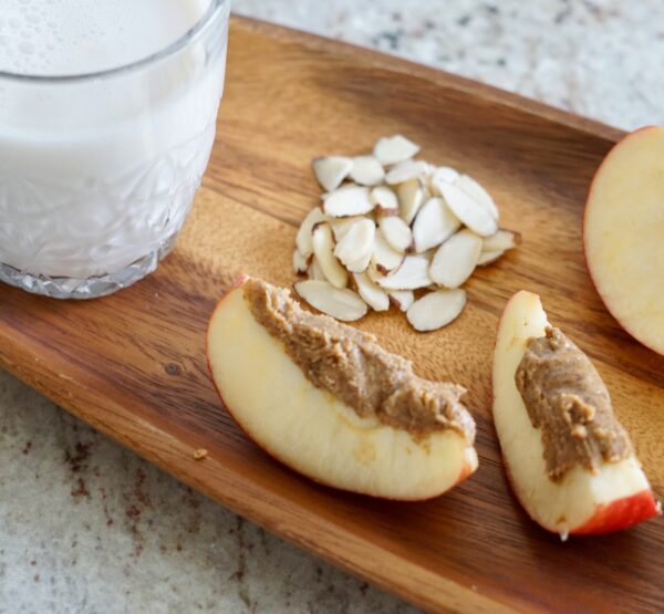 slivered-almonds-almond-butter-on-apple-slices-an-2025-01-10-15-11-56-utc - SKIDamarink KIDs Protein snacks for kids, how nutrition affects child behavior